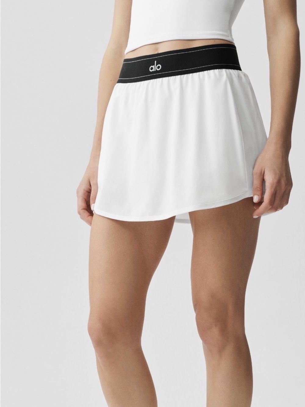 ALO Yoga White Mini Skirt with Black Branded Waistband